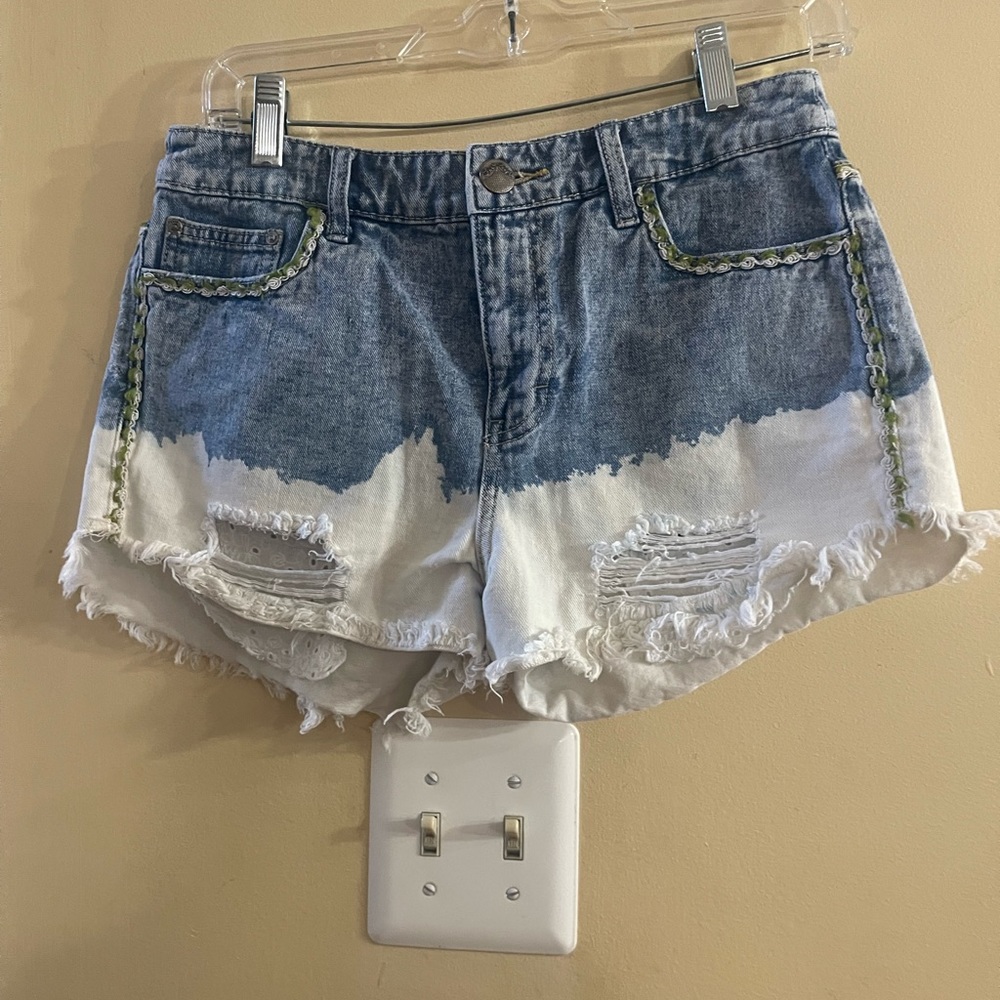 Free People distressed denim shorts, with unique details